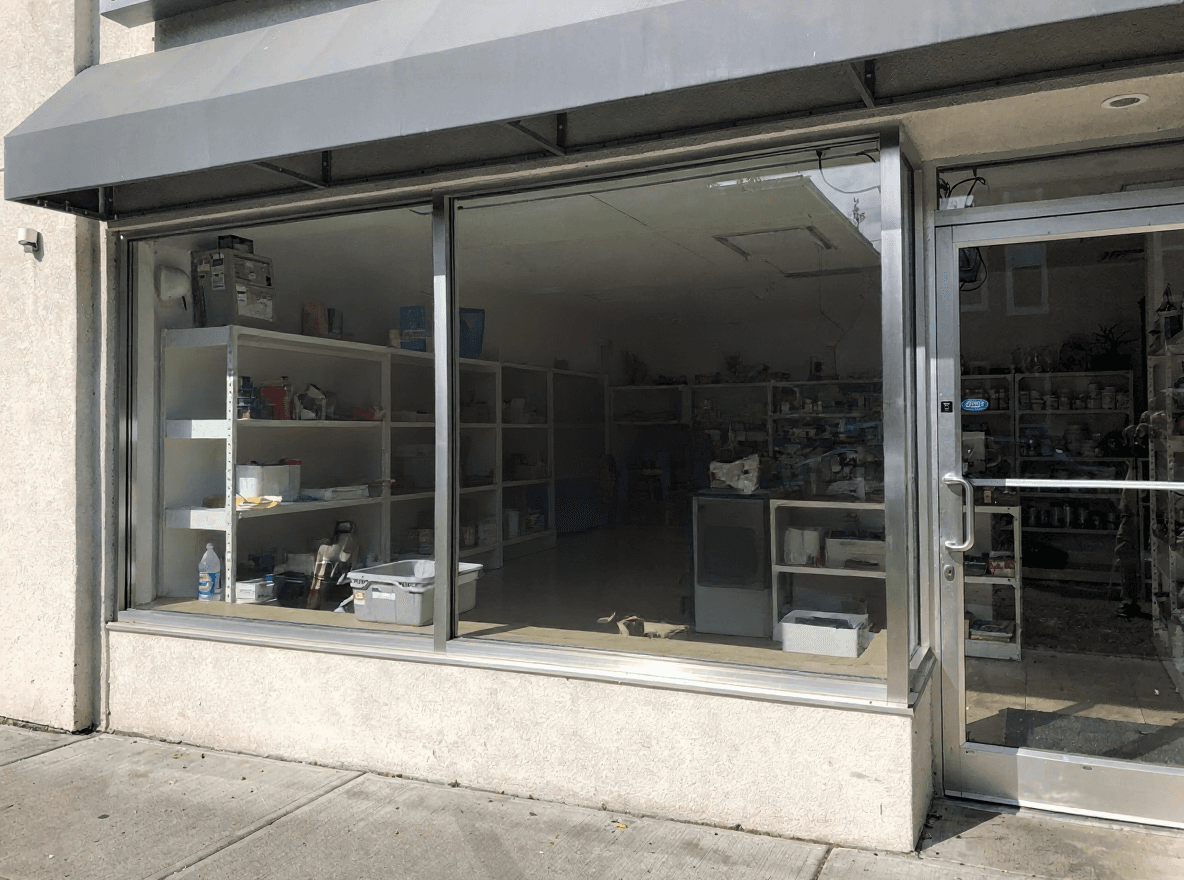 The same storefront window clean and clear after a Brisk cleaning